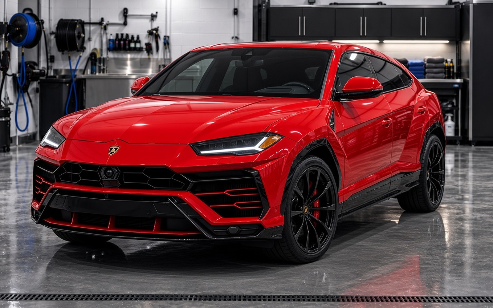 Red Lamborghini Urus in the shop for Restore